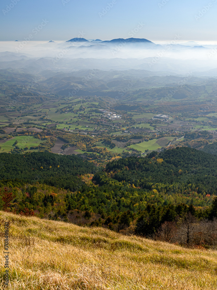 Panoramic view towards south from the summit of mount Carpegna; the mountains Nerone and Catria in the background; Pesaro-Urbino province, Marche region, central Italy
