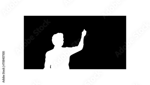Teacher writing on blackboard, black isolated silhouette