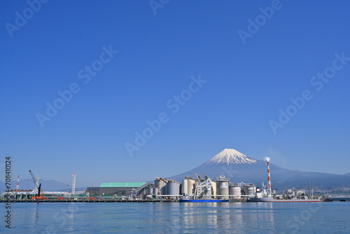 Fuji Mountain and Fisherman boats with Japan industry factory area background view from Tagonoura Fisheries Cooperative cafeteria, Fuji City, Shizuoka prefecture, Japan