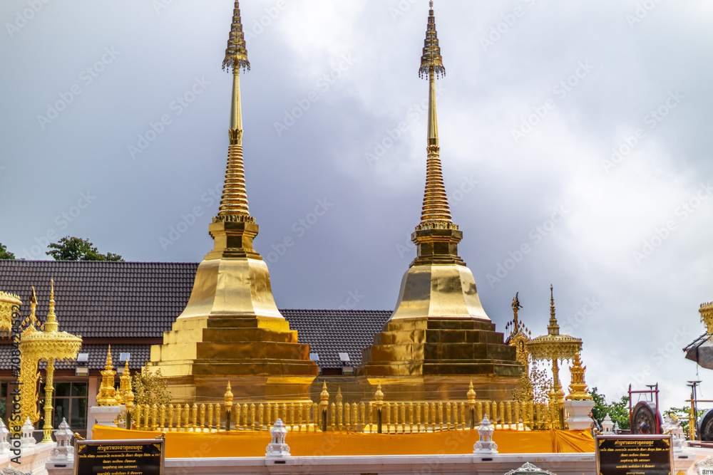 Fototapeta premium Background of religious attractions in Thailand's Chiang Rai(Phra That Doi Tung) is a temple in the north on the mountain, with an old golden pagoda, popular tourists come to make merit.