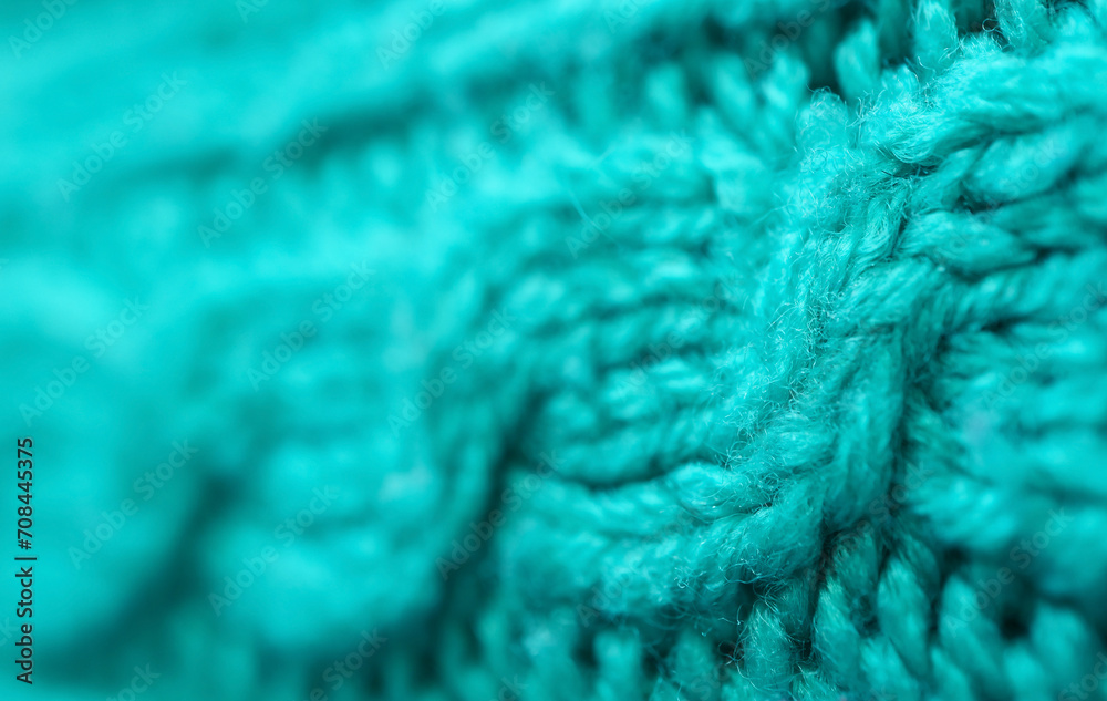 Closeup of the Pattern and Texture of Turquoise Blue Knitted Wool Fabric Closeup of the Pattern and Texture of Turquoise Blue Knitted Wool Fabric