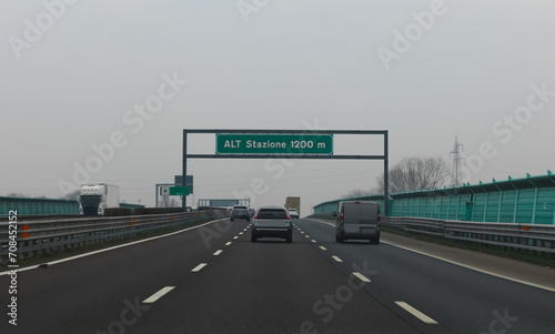 motorway sign with the words Alt toll 1200 meters away photo