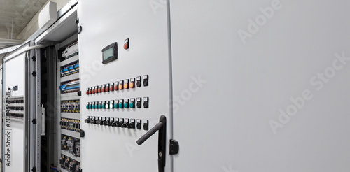 Electrical and electronic panel cabinet for automation and system control of industrial processes, Hvac, management of heating, ventilation, air conditioning and cooling. With copy space background photo