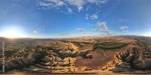 VR 360 View. End of the World Viewpoint. Panoramic aerial view of mountainous desert area. Ravines, caves and cliffs in a colorful sunset. Andalusia. Spain.
 photo