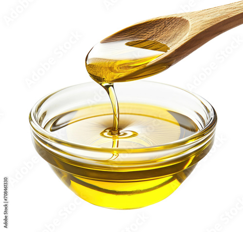 Wooden spoon pouring extra virgin olive oil into a glass container, isolated on white or transparent background photo