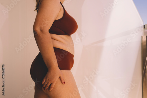 Confident young woman feeling positive and comfortable in her body.
