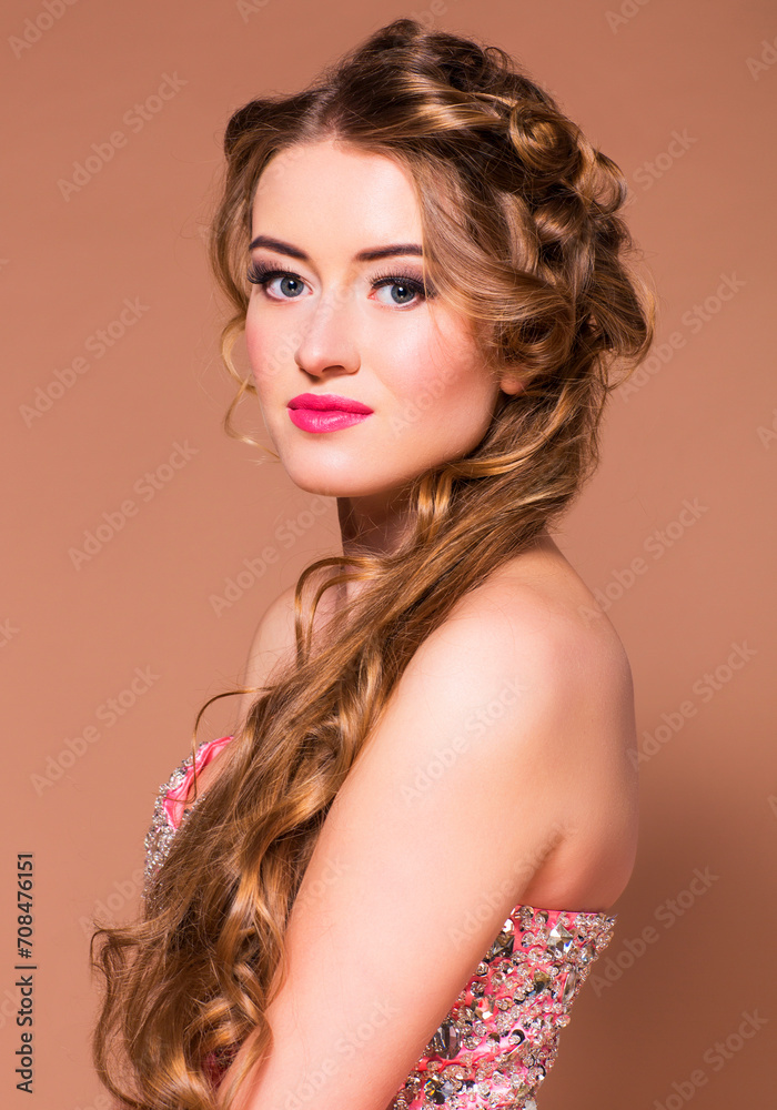 Fototapeta premium Portrait young beautiful blond woman with long hairdress