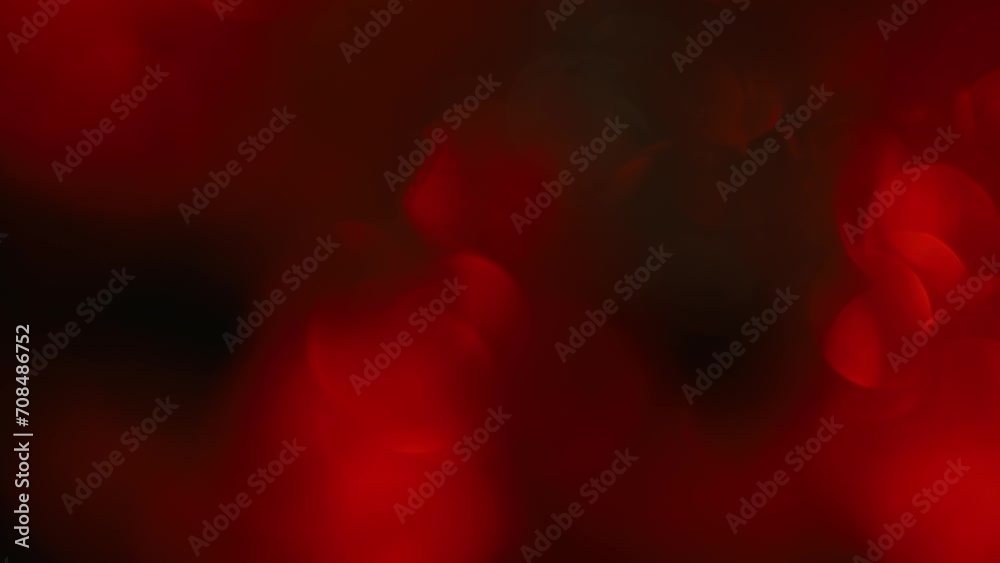 Dark and red glow of the blurred background abstract background with dynamic bokeh Dark and red glow of the blurred background abstract background with dynamic bokeh