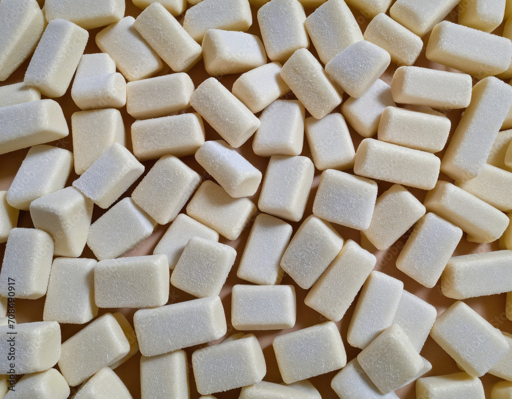 Traditional Indian candy, Chikki, showcased against a plain white background Traditional Indian candy, Chikki, showcased against a plain white background