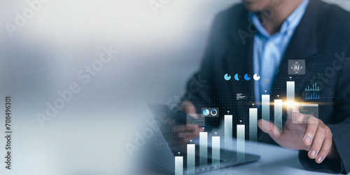 Businessmen analyse corporate growth, future business growth arrow graph, development to meet goals, business perspective, and financial data for investment using artificial intelligence (AI) photo