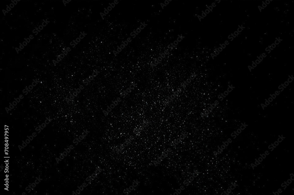 Dust and scratches on a black background.