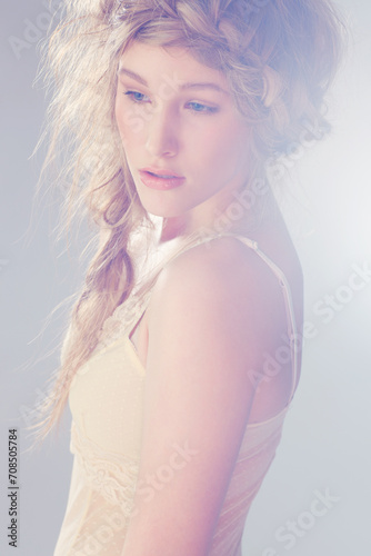 Thinking, fashion and woman with fantasy, mythology and magic style as fairy in a studio. Aphrodite, braid and wild hairstyle with dream, goddess and magical mist with vintage and. retro clothing