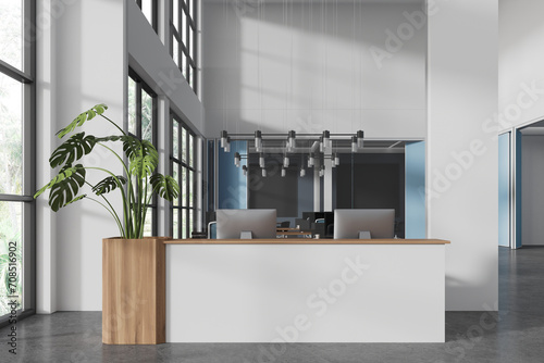 White and blue office interior with reception