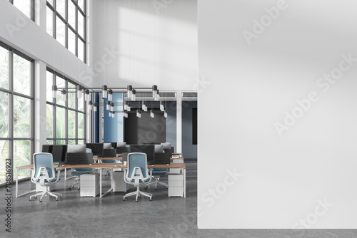 White office interior with coworking space with technology, window. Mockup wall