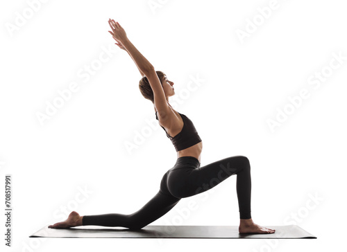 Young beautiful woman practicing yoga isolated transparent PNG. Young beautiful girl doing exercises isolated studio shot. Harmony, balance, meditation, relaxation, healthy lifestyle concept