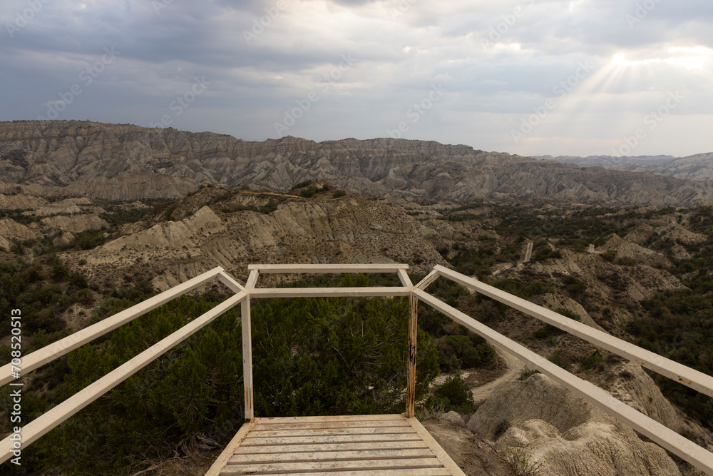 Landscape of Vashlovani national park in Georgia with  dry grass and sandstone mountain cliffs