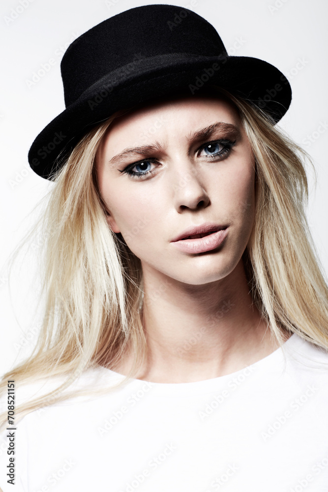 Woman, portrait and fashion in studio, attitude and eyeliner or makeup by white background. Female model person, casual clothing and vintage style and face, hat and confidence or pride by backdrop Woman, portrait and fashion in studio, attitude and eyeliner or makeup by white background. Female model person, casual clothing and vintage style and face, hat and confidence or pride by backdrop