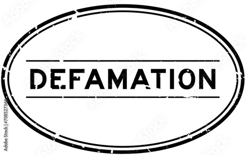 Grunge black defamation word oval rubber seal stamp on white background