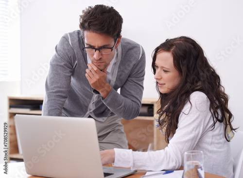 Business people, teamwork and thinking on computer for copywriting solution, ideas or feedback in office. Professional writer, editor or woman and man brainstorming on laptop of social media strategy