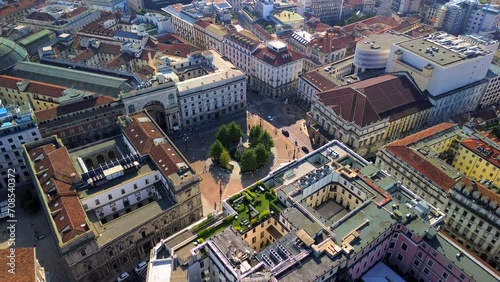 Aerial view of the Old Square with a monument to the artist and inventor Leonardo da Vinci next to the La Scala opera house theatre. Vittorio Emmanuele gallery in Milan Italy 2024 photo