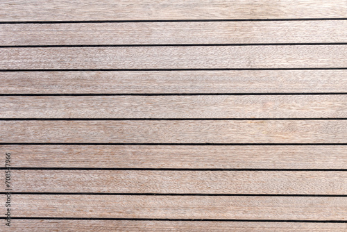 Teak wood deck texture background. Wooden deck on super yacht. Yachting concept. photo