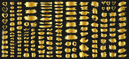 Big set of golden vector textured brush splashes. Detailed rough luxury blots, ink smears, paint smudges, pencil stains as text boxes. 