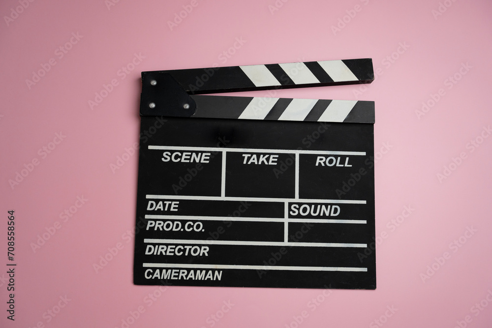 movie clapper on the table ; film, cinema and video photography concept