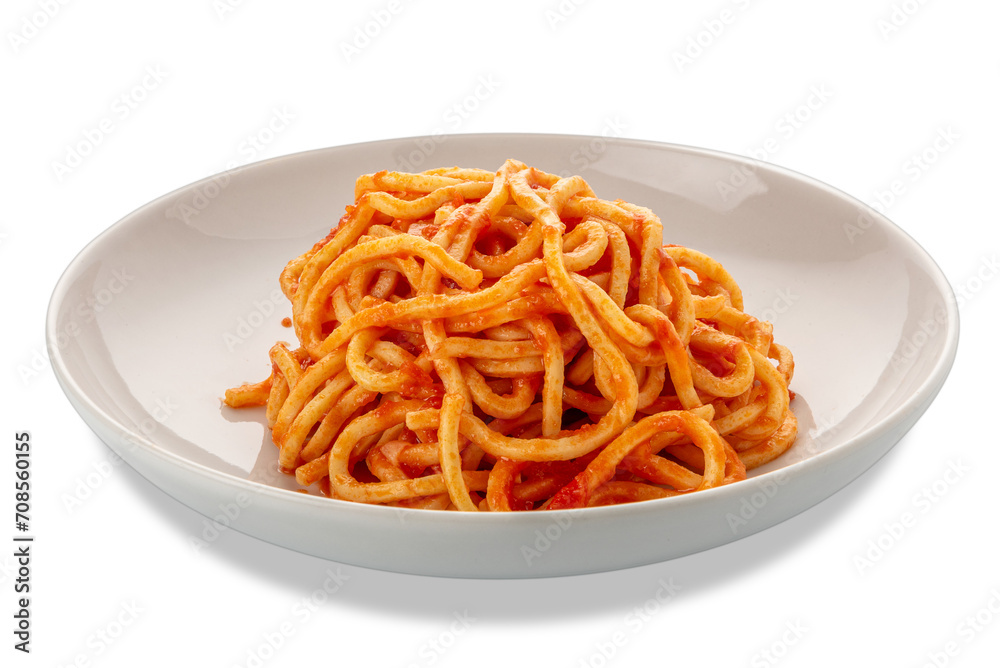 Square spaghetti, called spaghetti alla chitarra in Italy, pasta topped with red tomato sauce in a white plate isolated Square spaghetti, called spaghetti alla chitarra in Italy, pasta topped with red tomato sauce in a white plate isolated