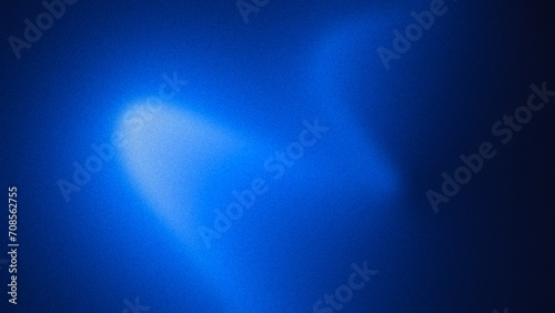 abstract blue background with grain. Unfocussed wall illuminated with neon light. Modern wallpaper photo