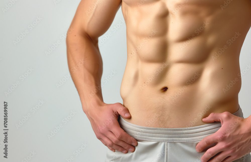 Fototapeta premium Athletic, flat male belly close-up.