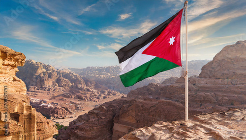 Jordan flag waving on the wind against Petra and Jordan city