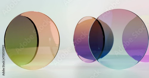 Animation сolorful translucent glass blocks spin and rotate on light background, round lenses.Loop 3d Render.