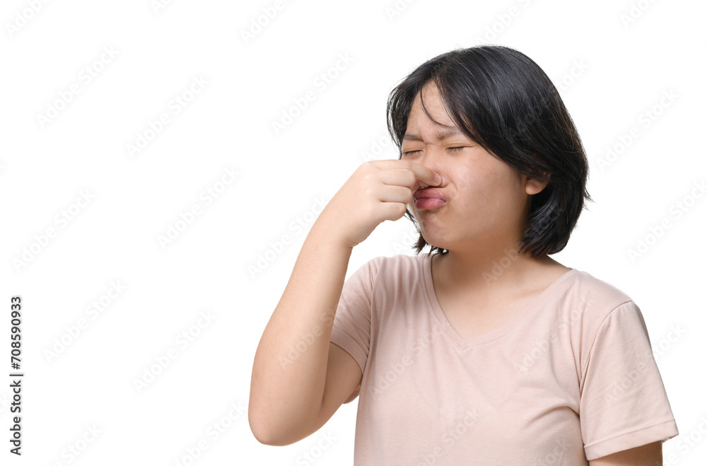 cute girl wearing a pink T-shirt covers her nose with her hand because smells bad. cute girl wearing a pink T-shirt covers her nose with her hand because smells bad.
