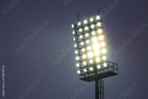 Floodlight for the football field, many lamps in the twilight