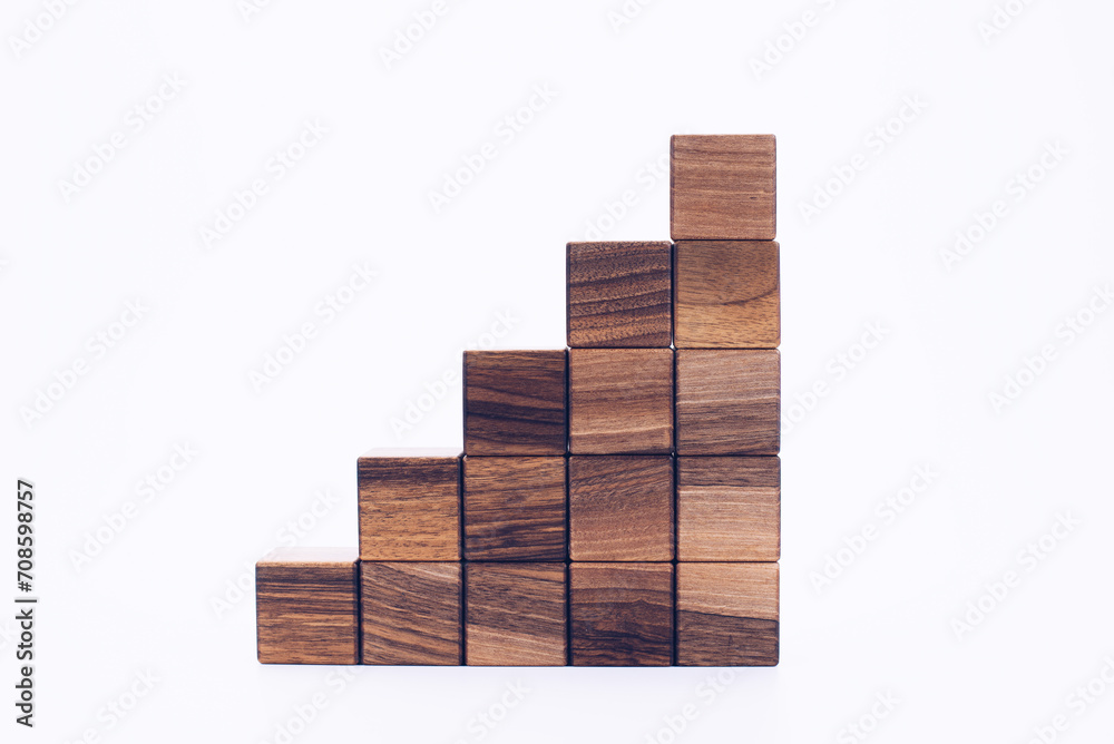 Wooden cubes. 3D blocks of wood in the shape of a pyramid. On a white background. Designer. Steps to achievement Wooden cubes. 3D blocks of wood in the shape of a pyramid. On a white background. Designer. Steps to achievement