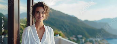 Young woman in a bathrobe on a hotel balcony. Banner, place for text #708599977