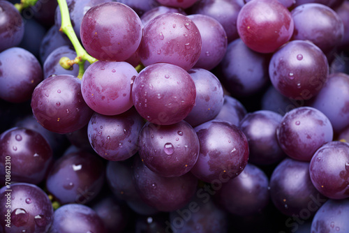 Ripe, Juicy Grapes on Fresh White Branch, Bursting with Sweetness and Nutrition, Against a Background of Vibrant Purple and Blue Autumn Colors.
