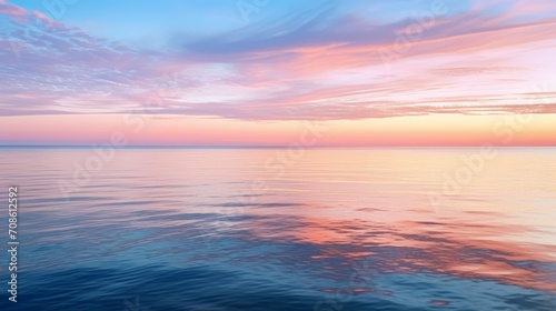 Tranquil ocean sunrise casting reflections on the calm water © Cloudyew