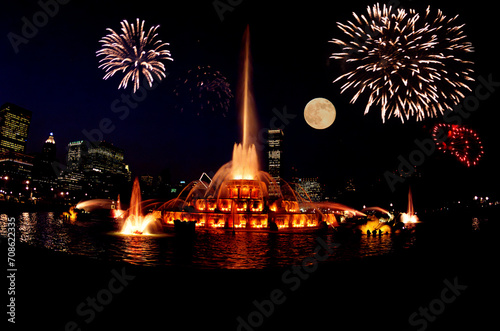 Spectacular Fireworks Display over Fountain at Night