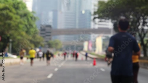 Wallpaper Mural Blur background with running and cycling sports activities in metropolitan cities Torontodigital.ca