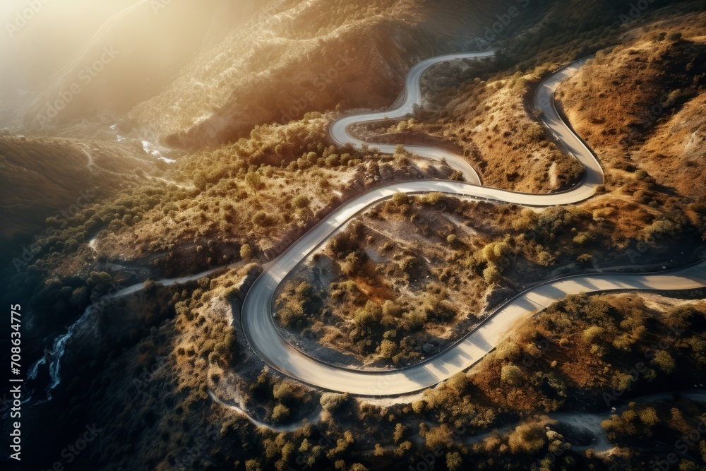 Aerial view of a winding road captured through drone imagery
