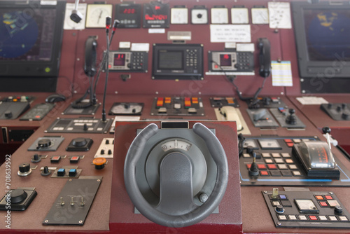 Ship's control device. Engine control from navigational bridge. Focused on helm, blured background.