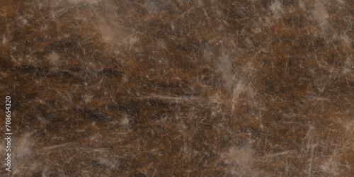 Brown scraped rusty grungy background. abstract brown leather texture may used as background and can be old wooden dirty background