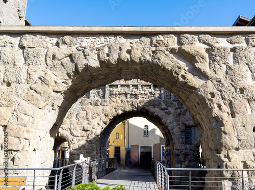 Aosta, Italy: the Porta Pretoria, dating from 25 BC, one of the best-preserved ancient Roman gates. photo