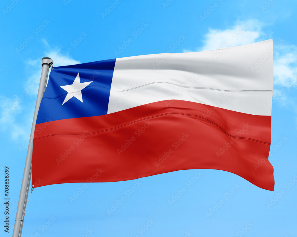 Naklejka premium Chile flag fluttering in the wind on sky.