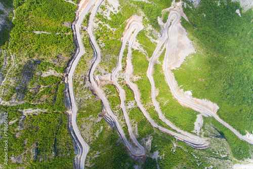 aerial view of Serpentine road in Albanian mountains photo