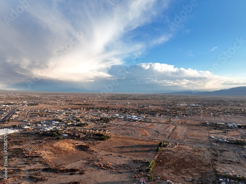 Aerial view of a town in the desert with a cloudy sky above. Pahrump, Nevada photo