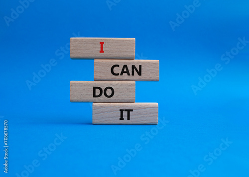 Fototapeta Naklejka Na Ścianę i Meble -  I can do it symbol. Concept words I can do it on wooden blocks. Beautiful blue background. Business and I can do it concept. Copy space.