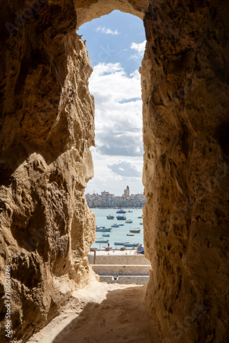 Mediterranean sea and small part of Alexandria seen through loophole of Citadel of Qaitbay