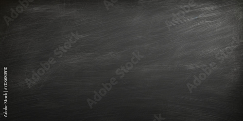 Abstract chalk rubbed out on blackboard or chalkboard texture, Blackboard with a blank . photo